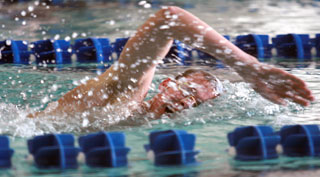 Panther swimming swept by Western 