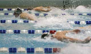 Panther squads swim past Decatur school 