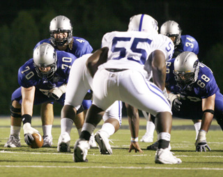 Football: Offensive line keep teams at bay 