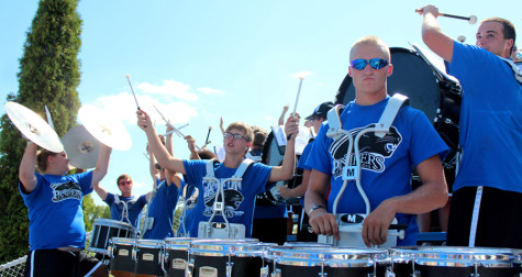 EIU Band members cheer.