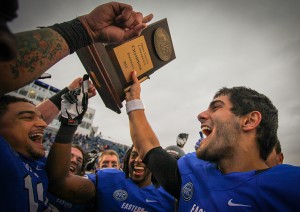 Former Eastern quarterback Jimmy Garoppolo and the Eastern football team celebrate, winning the Ohio Valley Conference title for the second straight year with a 52-14 win over Jacksonville State at O'Brien Field on Sept. 16, 2013.