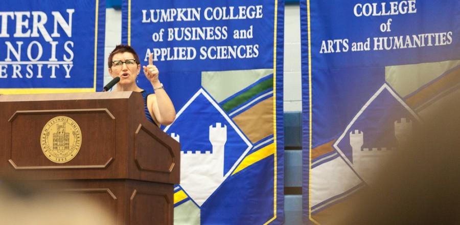 Women's studies coordinator and 2015-2016 faculty laurete Jeannie Ludlow delivers a speech to new students during convocation on Friday in Lantz Arena.  Ludlow told students to claim power, claim knowledge and to claim their education.