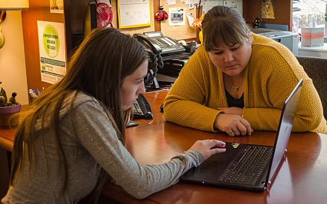 Allison Frees-Williams, interim director of career services, helps Sarah Leedham a freshman family and consumer sciences major with updating her resume for a scholarship during the 30 Minute Resume sessions Tuesday afternoon. Career Services is available to all students looking to write and update their resumes. They are located in the Human Services Center in room 1301.