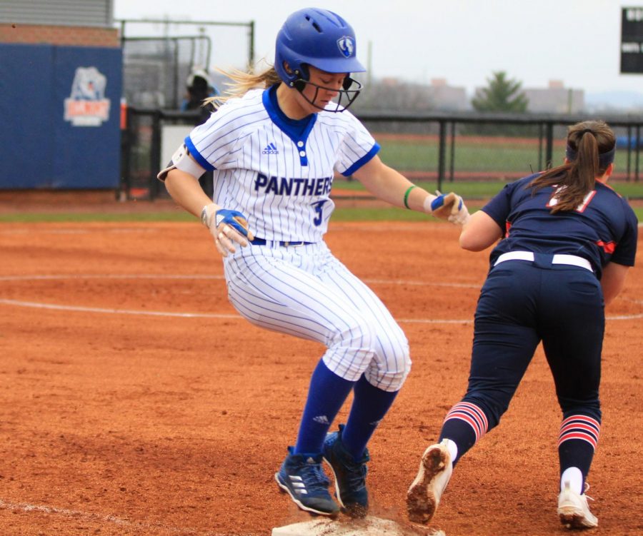 Eastern junior Kayla Bear reaches first base in a game against Belmont on Saturday. Eastern won both games of a doubleheader against the Bruins in Nashville.