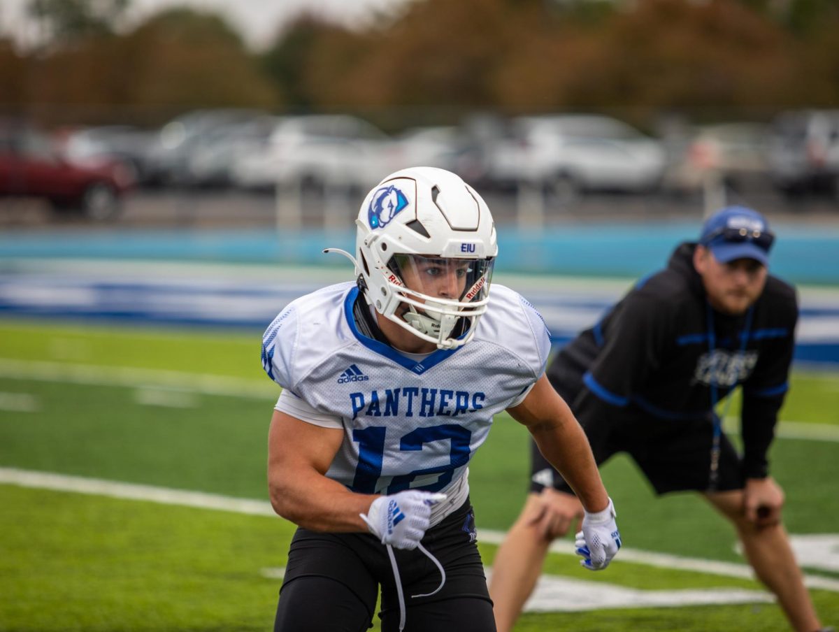 Nick Coates, a junior defensive back, prepares to tackle a teammate during a drill at O‘Brien Field Wednesday Evening.