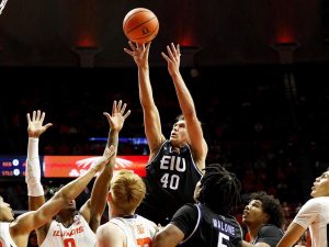 Redshirt sophomore forward Kooper Jacobi puts the ball up in the paint during the Panther's first men's basketball game of the season against the Fighting Illini in the State Farm Center Monday night. Jacobi led the Panthers by scoring 10 points and rebounding 11 shots. 