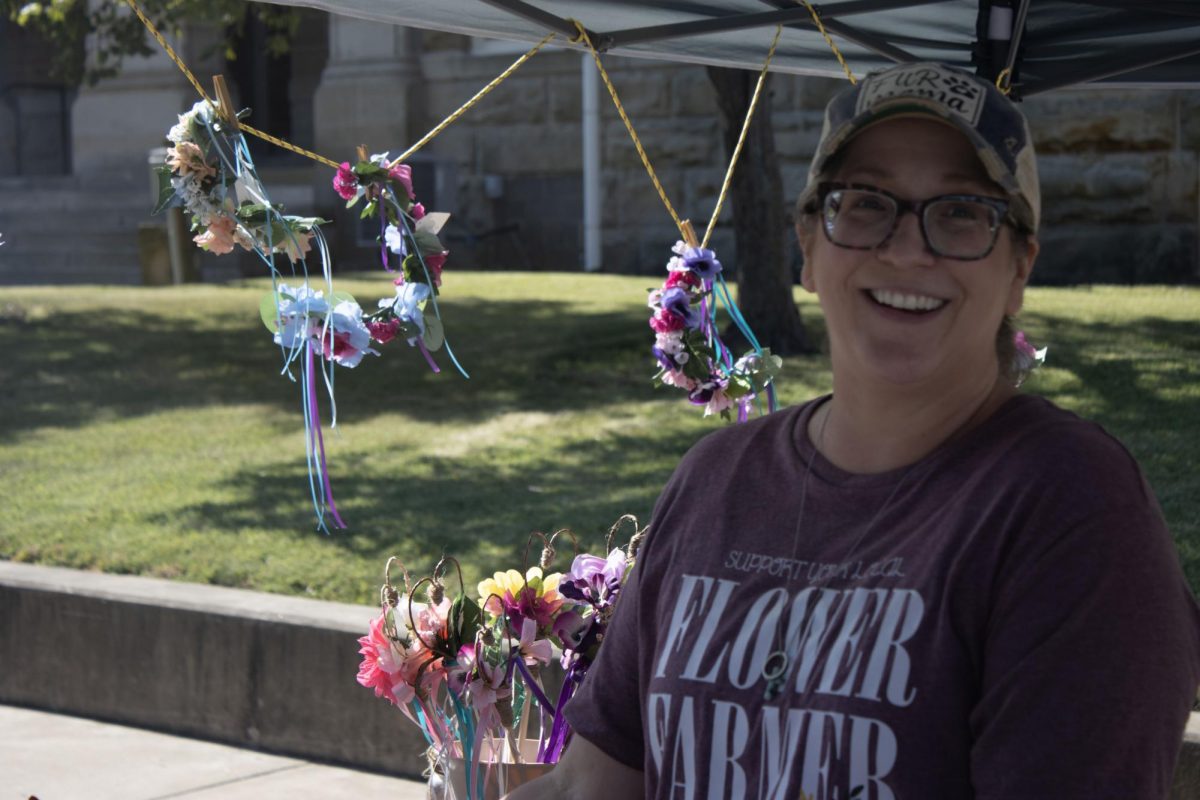 Cristina Behrend, special education professor at Eastern, runs a stall called Behr Buds. She sells knitwear and flower accessories.