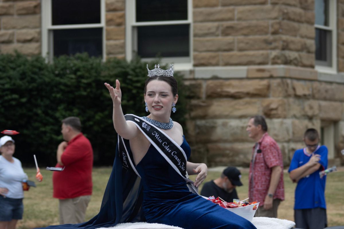 2023s Miss Coles County Fair winner, Laney Wright, tossed candy to the parade crowd.