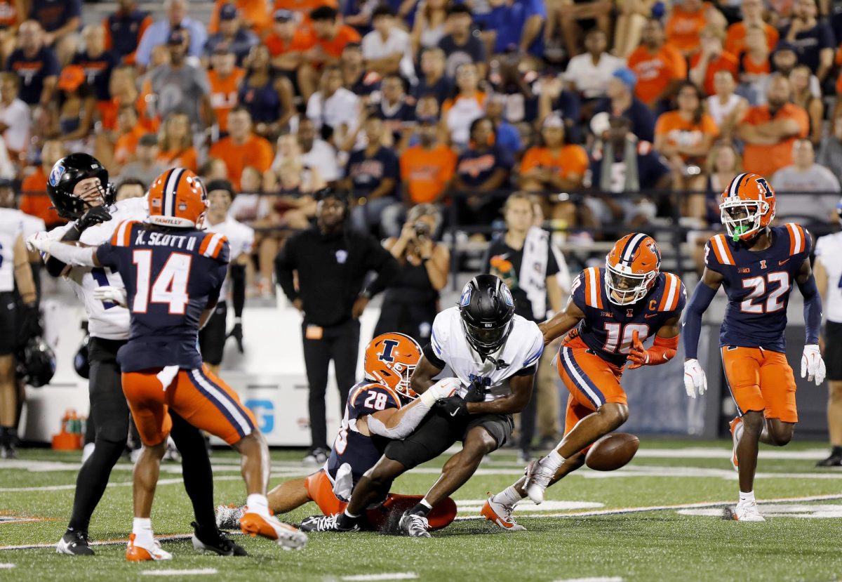 Senior wide receiver DeAirious Smith drops a pass during the team's season opener against the University of Illinois at Champaign-Urbana at Memorial Stadium Thursday night.