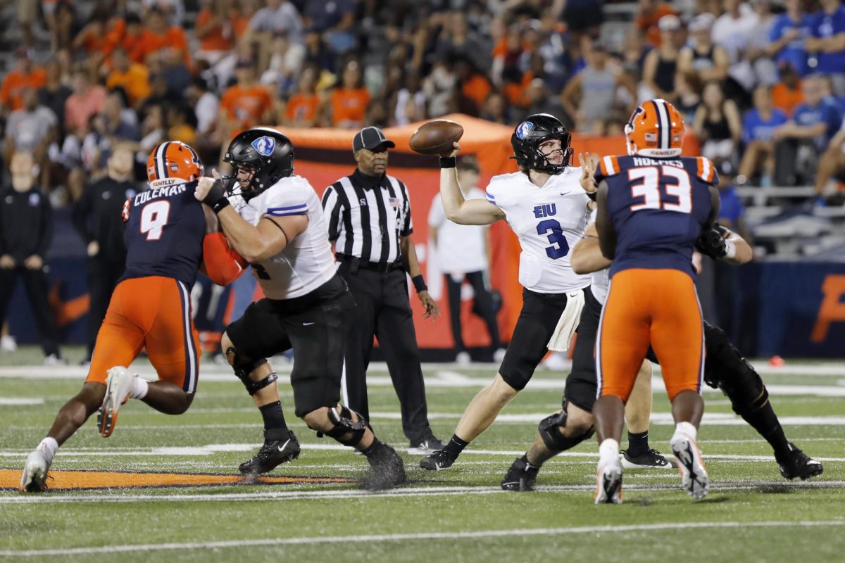 Panther football's Pierce Holley (3) prepares to throw the ball at the EIU v. UofI game Thursday.