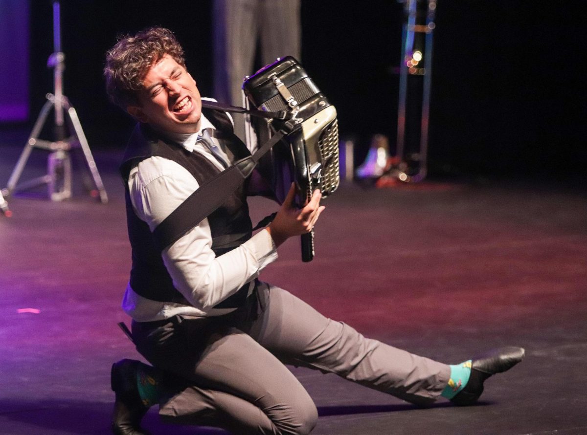 SUBMITTED PHOTO | THE DOUDNA FINE ARTS CENTER
The Fourth Wall percussionist Greg Jukes plays the accordion during  "Fruit Flies Like a Banana" at The Theatre in the Doudna Fine Arts Center Saturday.