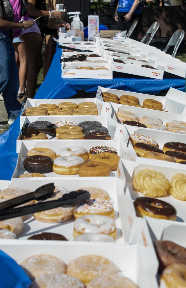 Lumpkin College of Business and Technology holds the Dunkin' the dean on South Quad, to raise money for EIU campus food pantry.