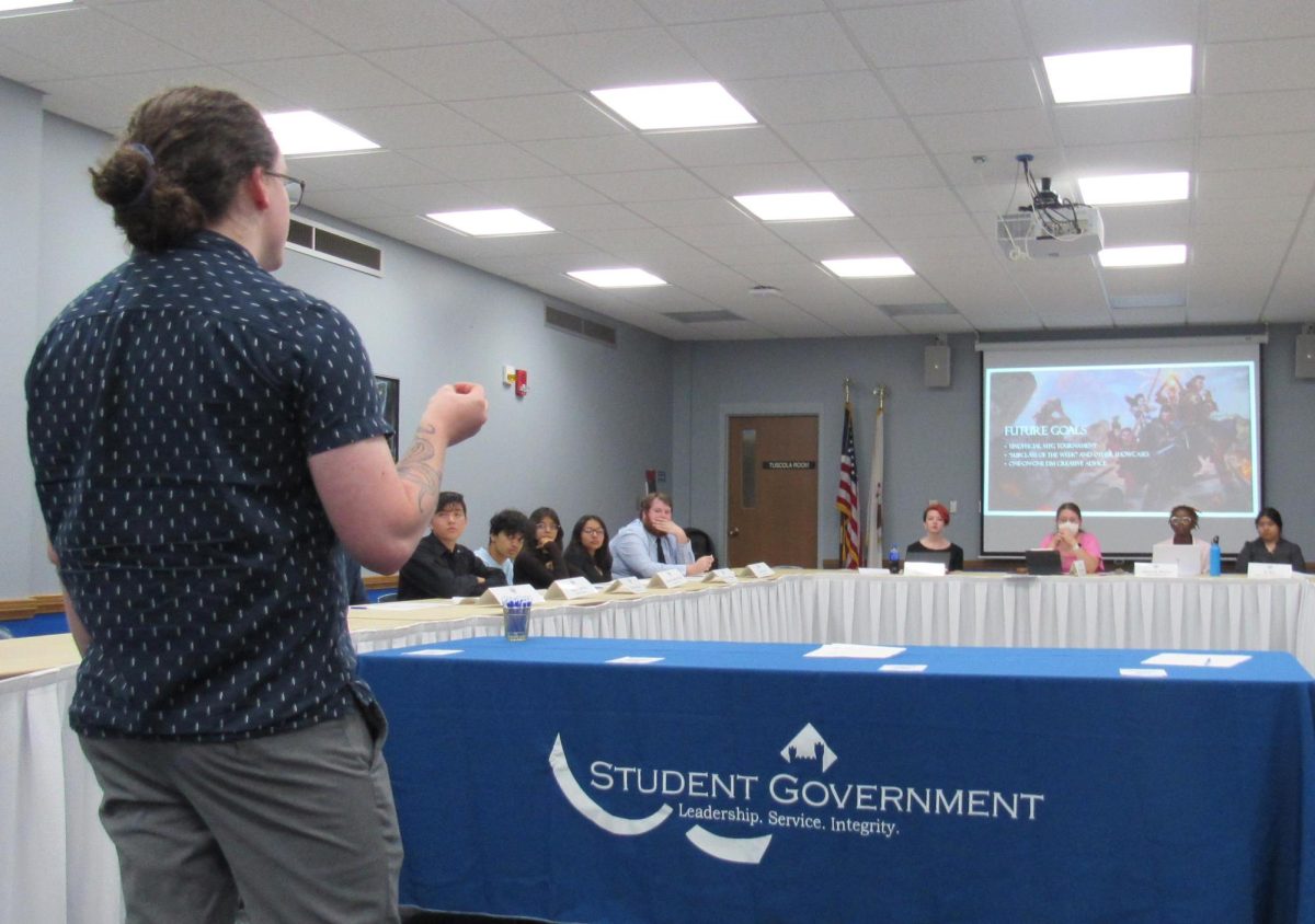 EIU D&D club president Nate Turner presents his case for approval of the club to the EIU Student Senate Wednesday.