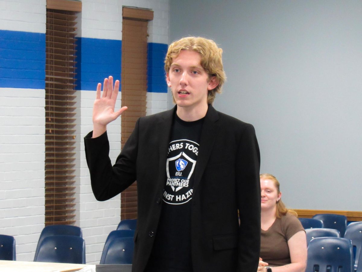 Mason Tegeler pictured taking the oath of office was promoted to the role of Vice President of Student Affairs on Wednesday during the student senate meeting in the Arcola Tuscola room 