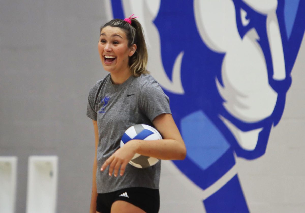 Graduate student middle blocker Ireland Hieb cheers with her teammates in Groniger Arena at Eastern Illinois' campus Charleston Illinois, Sept. 26 2024