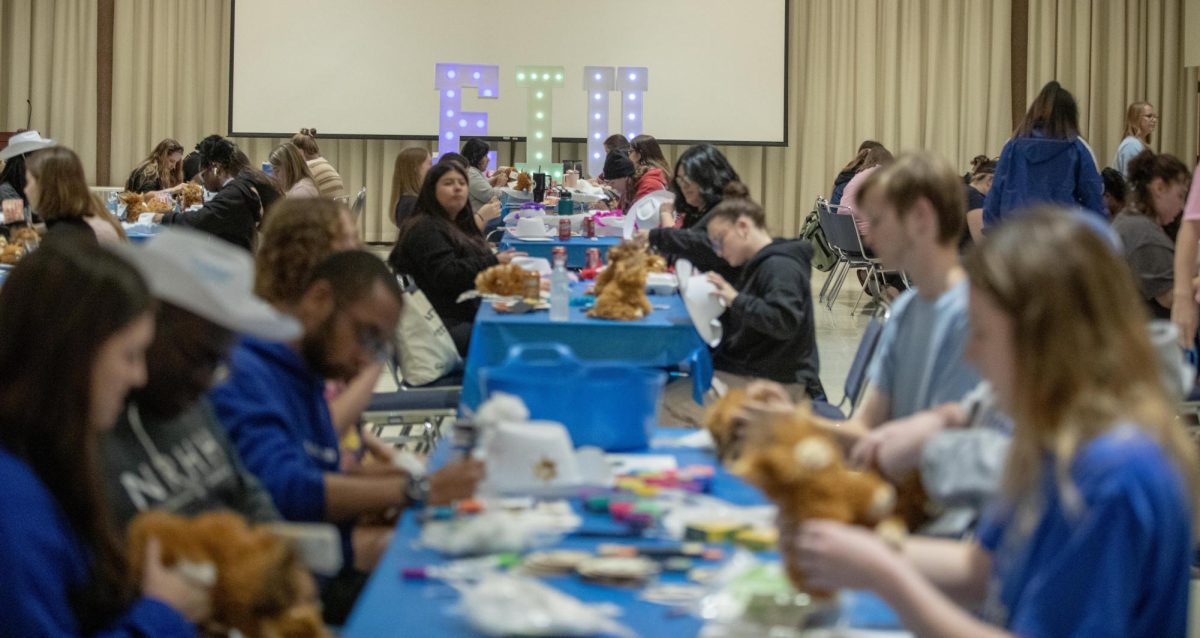 Students gather for during the homecoming week event Western Craft Night in the University Ballroom in the Marin Luther King Jr Union, too decorate hats, enjoy music and to stuff a stuffed cow, on the Eastern Illinois University campus, Charleston Ill. Tuesday night Oct. 1,2024. 