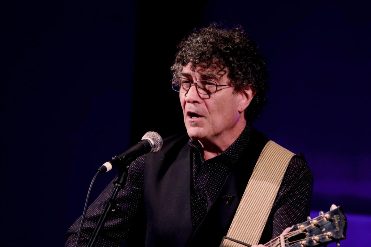 Chris Vallillo performing " This Little Light of Mine" along with songs of the Civil Right Movement" to show how music played an important role in historical struggles as a way to spread the message of equality and justice, in the Doudna Fine Arts Center Recital Hall, on Thursday night