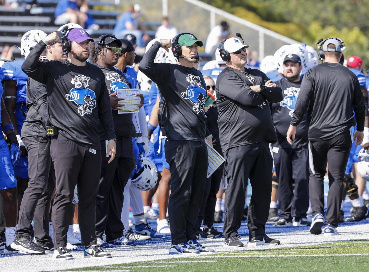 Eastern's coaching staff directs players in between plays during EIU's homecoming at O'Brien Field against Southeast Missouri State University Saturday afternoon. The Panthers lost 34-27 against the Redhawks.