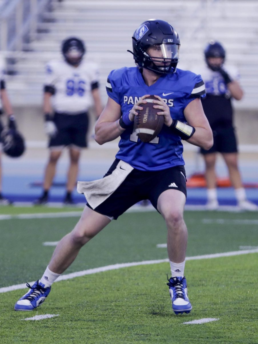 Quarterback Redshirt Freshman, Blainey Dowling, prepares to throw the ball while doing a scrimmage drill on O'Brien Field 