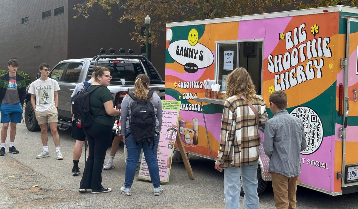 The owner opens up his food truck “Jori Express” to the new coming customers this morning in the Library quad