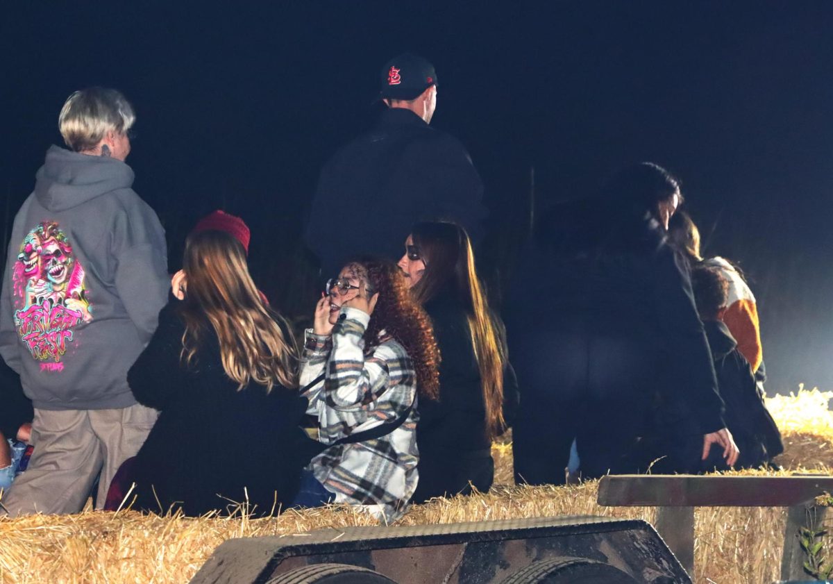 Participants of the Haunted Hike take a hayride back to the entrance of Douglas Hart Nature Center. The guided hikes took off every five minutes on the trails to cycle through the different Beetlejuice themed stations on Saturday night, Oct. 19, from 5-8 p.m.