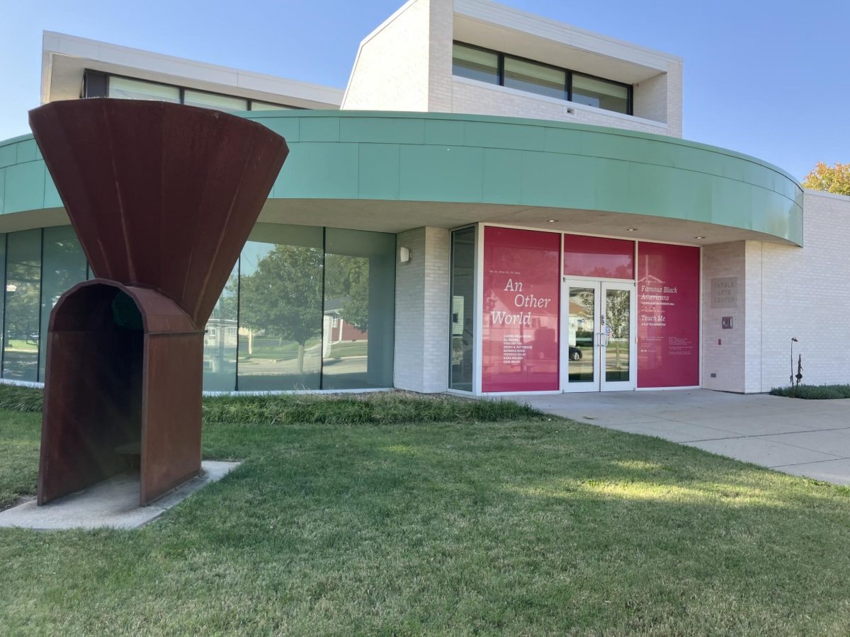 The outside of the Tarble Arts Center showing three exhibitions: An Other World, Famous Black Americans and Touch Me.