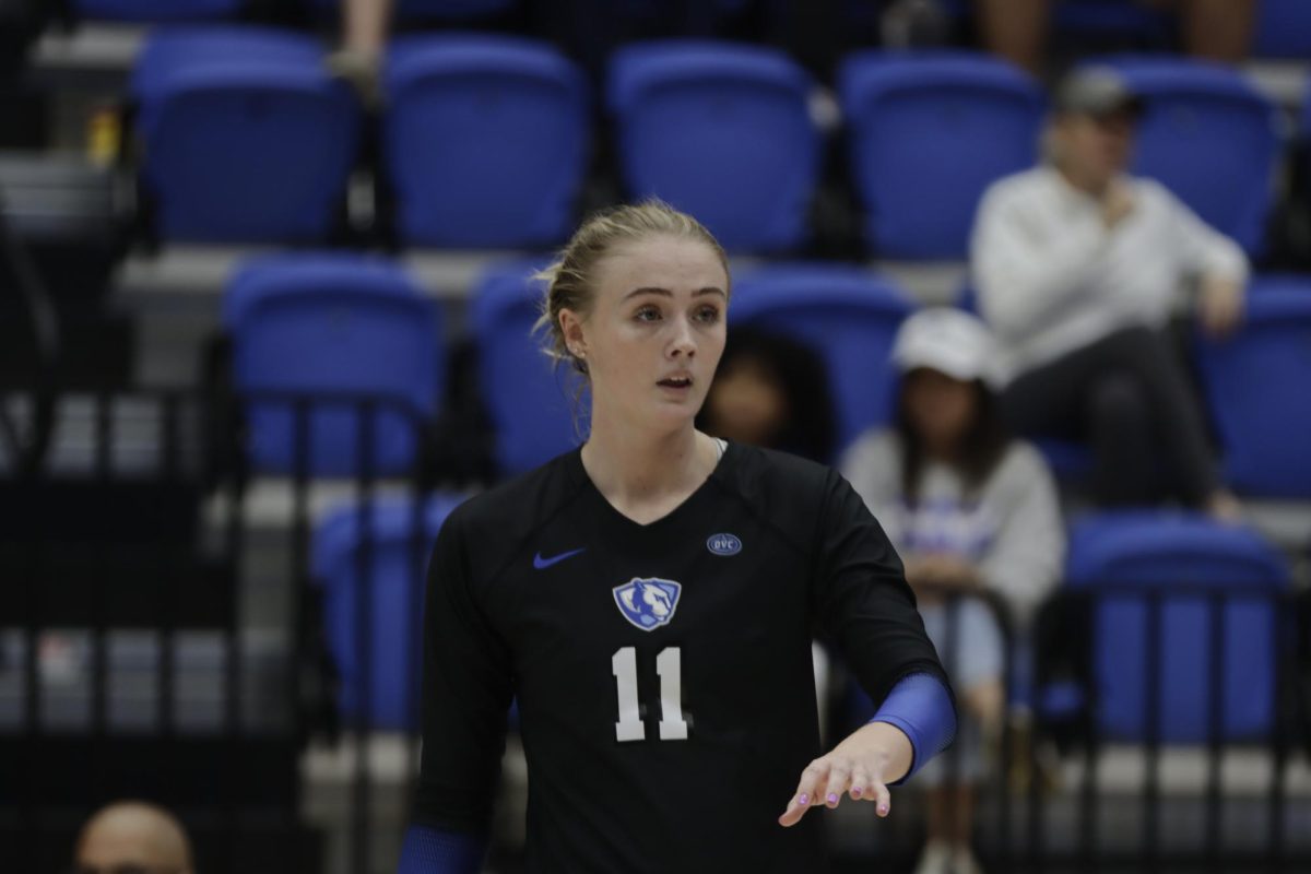 Freshman outside hitter Destiny Walker waits for a serve from Southern Indiana at Friday's game in Groniger Arena. The Panther's lost 3-0.