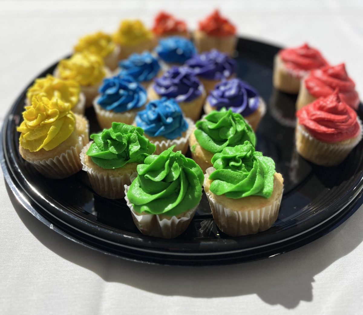 Rainbow cupcakes and other refreshments were handed out at the event for National Coming Out Day.