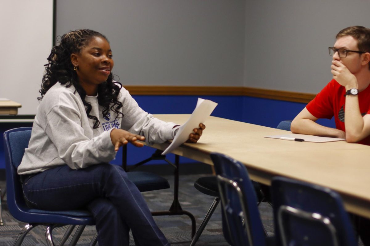 Ngozi Orji, a graduate in sustainability informs a group of students to share what race means to them tonight in the 3rd floor of the MLK building.
