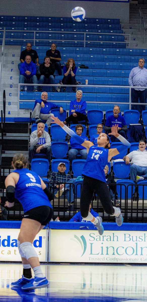 Junior outside hitter Lilli Amettis spikes the ball over the next winning another point for Eastern Illinois University, during the Eastern Illinois University against Southern Illinois University Evansville, on Tuesday 