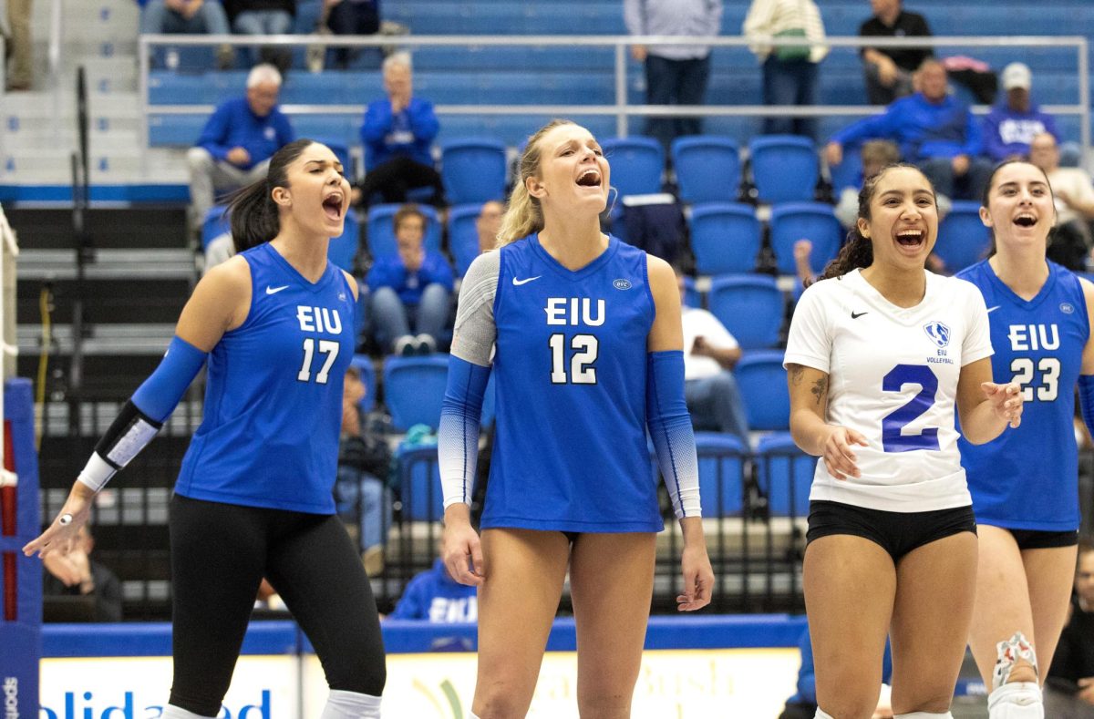 The EIU volleyball team cheers during the Eastern Illinois University against Southern Illinois University Evansville, on Tuesday Oct 15. 2024. at Groniger Arena