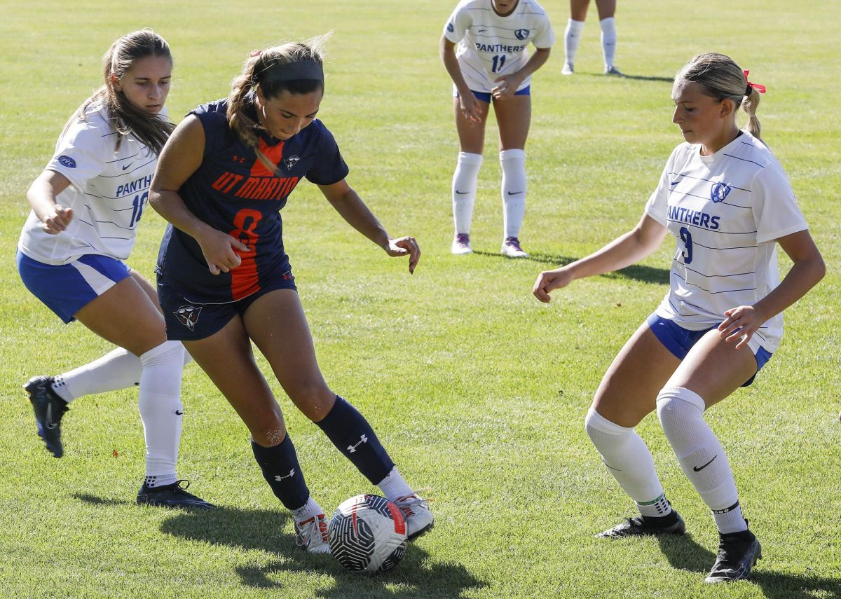 Sophomore and freshman midfielders Brooklyn Green, left, and Ella Dwyer close in on sophomore forward Peyton Cook, middle, during the women's soccer game against the UT Martin Skyhawks Sunday at Lakeside Field. The Panthers lost 1-0 against the Skyhawks. 