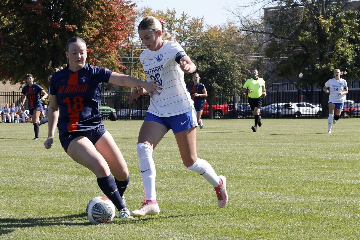 Sophomore midfielder Ella Rucka (18) attempts to get past junior midfielder Ella Onstott (20) during the women's soccer game against the UT Martin Skyhawks Sunday at Lakeside Field. The Panthers lost 1-0 against the Skyhawks. 