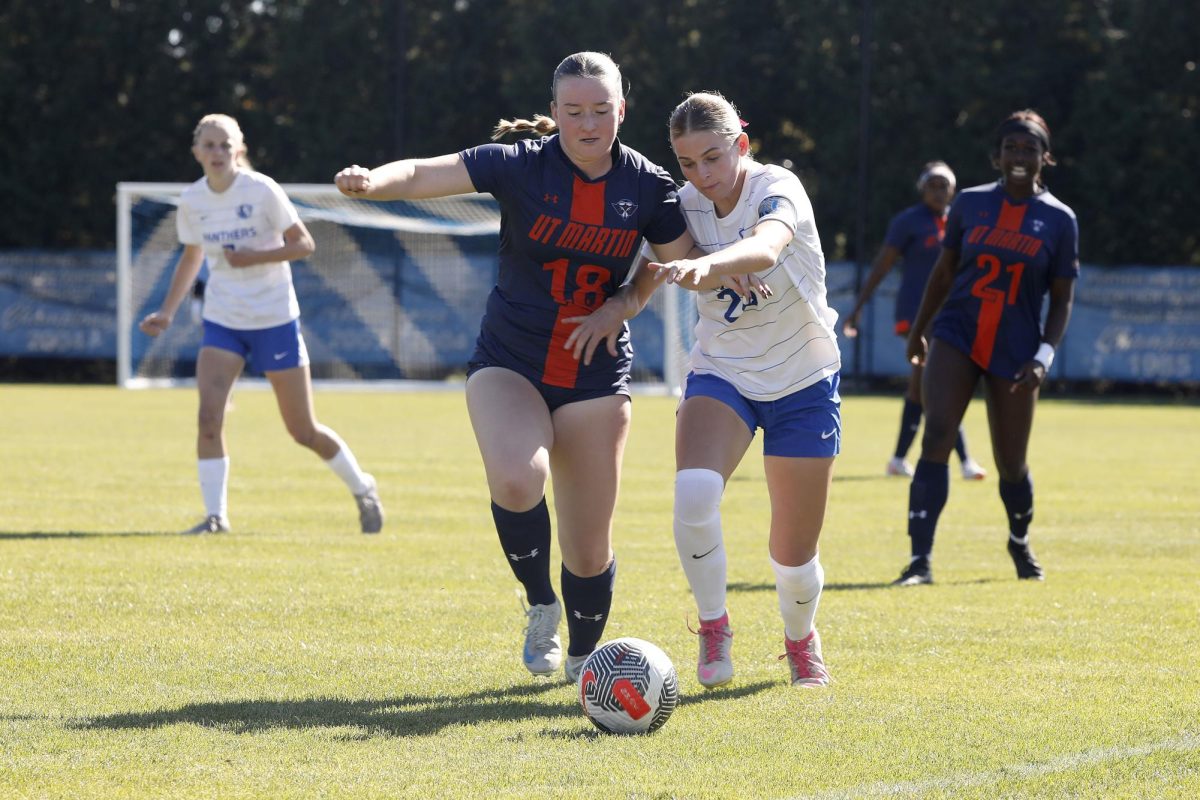 EIU junior midfielder Ella Onstott (20) and UT Martin sophomore midfielder Ella Rucka (18) battle for control of the ball during the women's soccer game against the UT Martin Skyhawks Sunday at Lakeside Field. Onstott had one shot on goal. The Panthers lost 1-0 against the Skyhawks. 