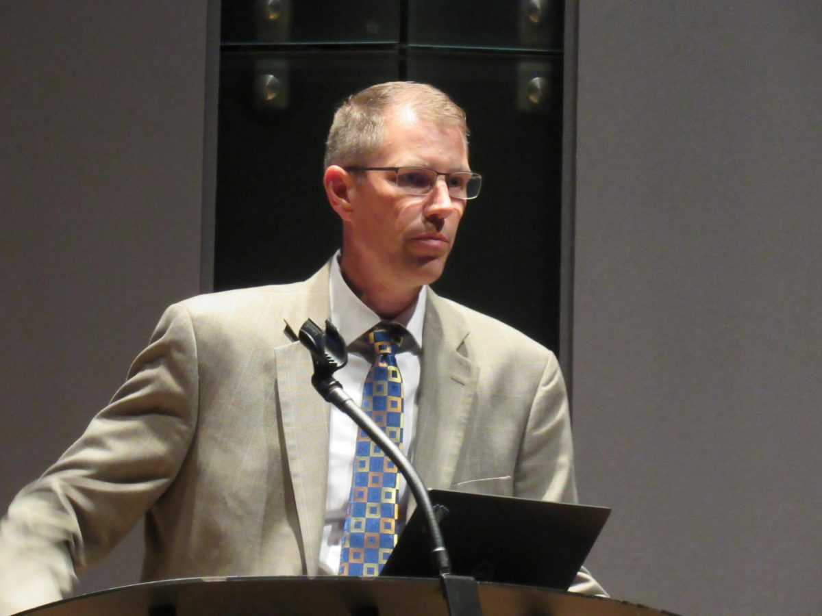 Vice President of Business Affairs Matt Bierman presents at the Eastern Illinois University budget town hall in the Doudna Recital Hall on Wednesday.