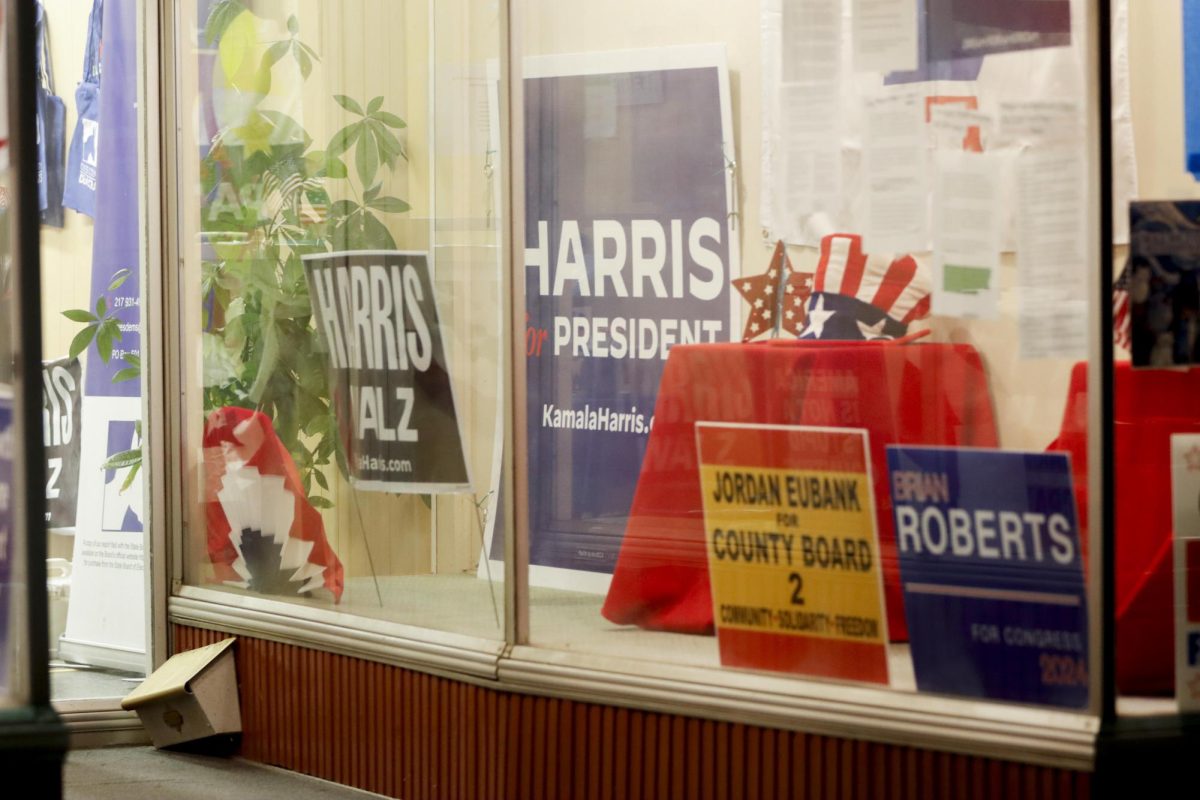 The outside of the Coles County Democrat headquarters was framed by political signs during the 2024 election watch party Nov. 5, 2024.