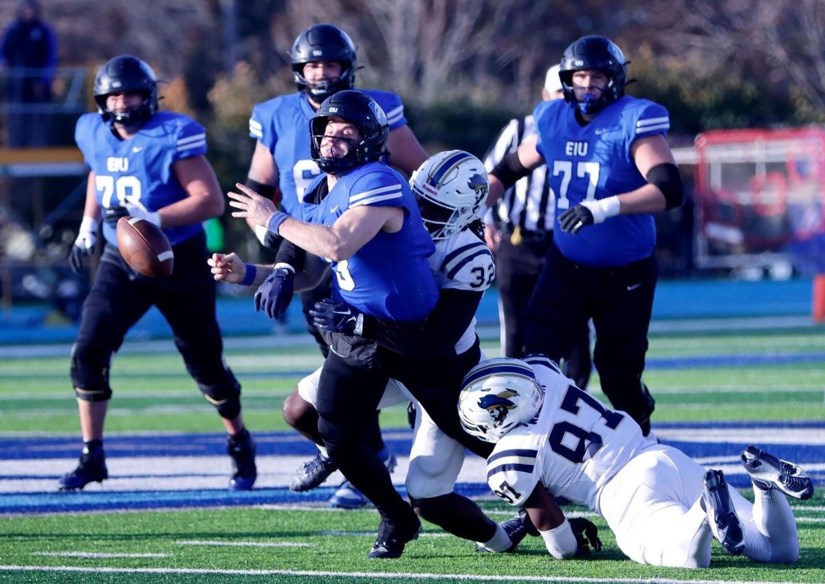 Eastern graduate quarterback Pierce Holley fumbles the ball during the football game against Charleston Southern University Saturday at O'Brien Stadium. The Panthers won 16-13.