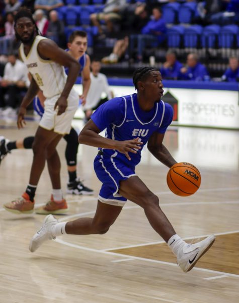 Gradute student Guard Artese Stapleton takes the ball to the rim on the other side of the court, during The Eastern Illinois University against Earlham Quakers men basketball game