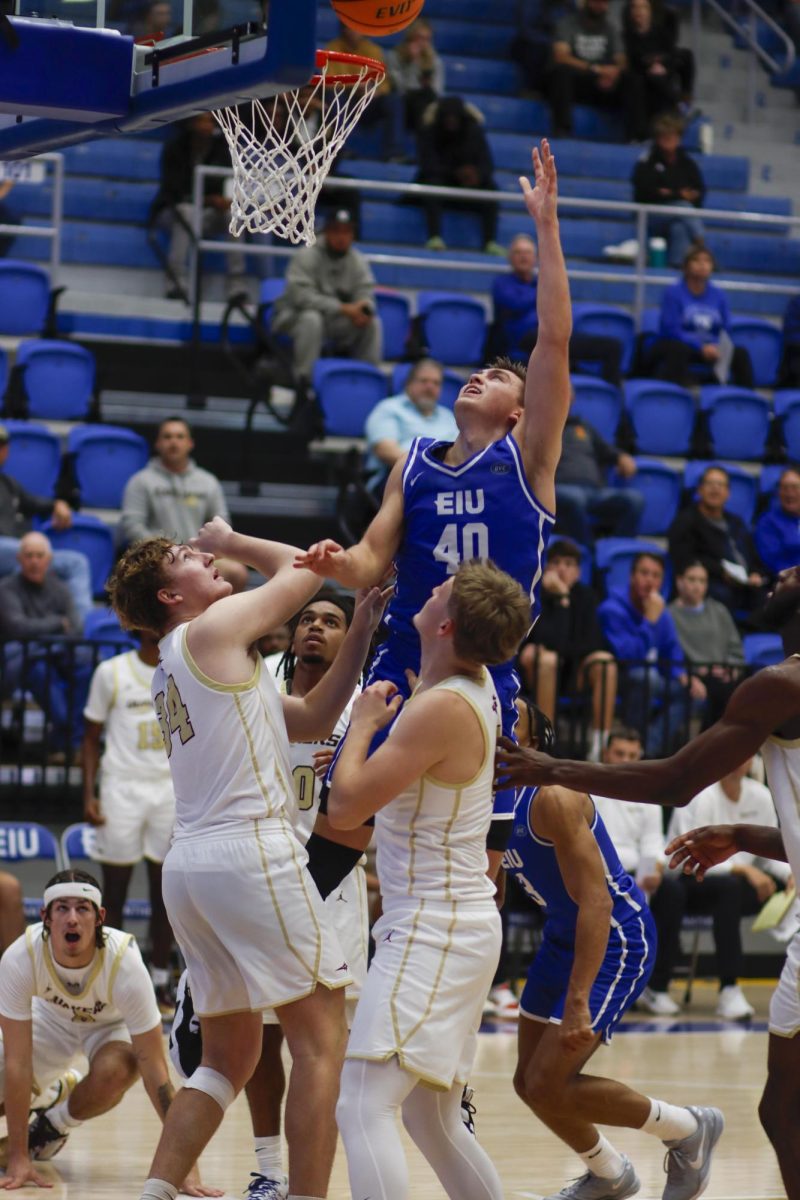 Graduate student forward Kooper Jacobi gets the shot in , during The Eastern Illinois University against Earlham Quakers men basketball game at Groniger Arena