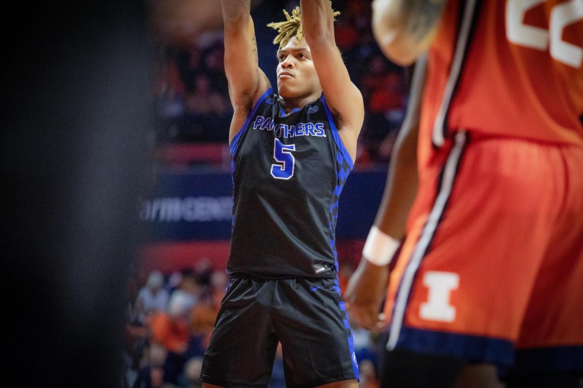 Junior Guard Zion Fruster, gets a free throw during the second half of the game, , The Mens Basketball team lost too the Univerisity of Illinois 112-67 in the Statefarm center on the U of I campus on Nov 04, 2024  in Champaign Ill. 