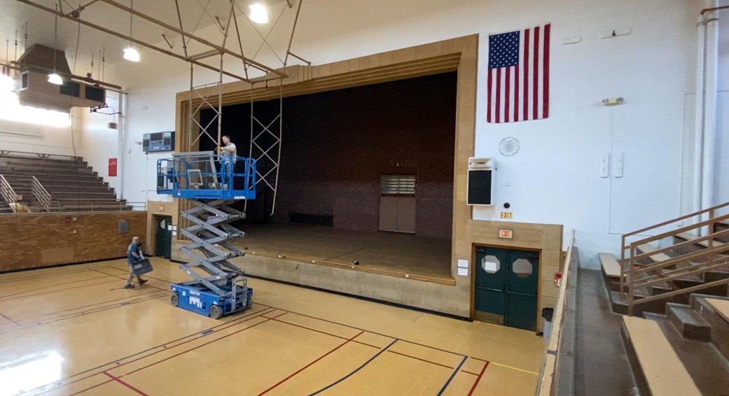 Crews begin renovations in south McAfee Gym on Oct. 30. The stage along the east wall will most likely be covered by a temporary barrier, according to EIU Athletic Director Tom Michael, but he isn't sure exactly how it will look on game day. 