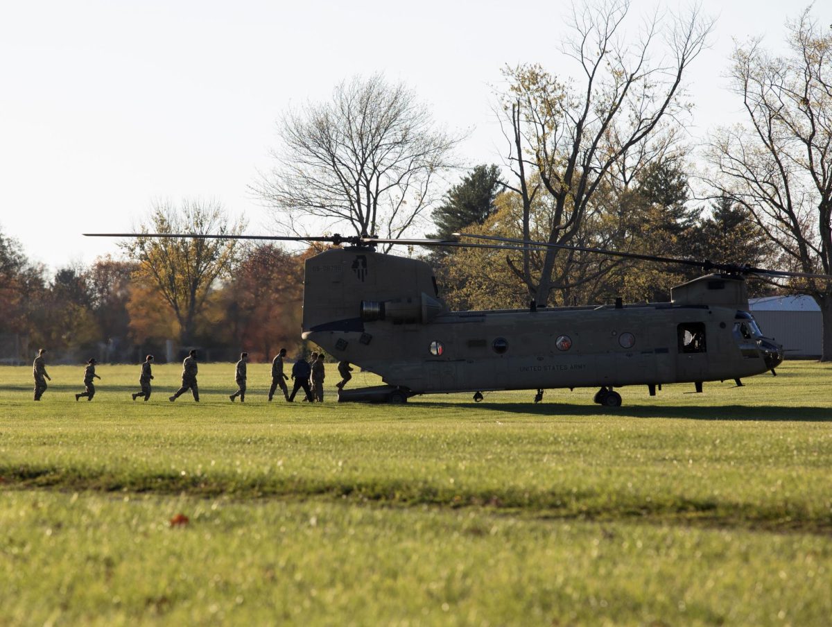 The EIU Reserve Officers' Training Corps loads the first group of cadets onto the Chinook aircraft for a ride around Charleston before landing back to the ground on Thursday. The ride was part of an aviation lab for cadets to learn what it was like to be on an aircraft. 