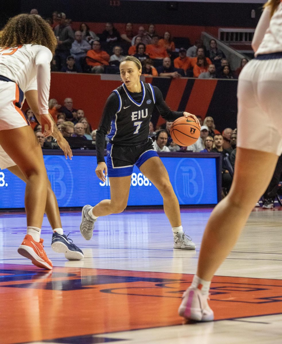 Guard Senior Kiyley Flowers, runs around the court and all the players to pass the ball as much as she can during the game against the University Of Illinois. 
The Womens Basketball team lost too the Univerisity of Illinois, in the State farm center on the U of I campus on Nov 14, 2024  in Champaign Ill.