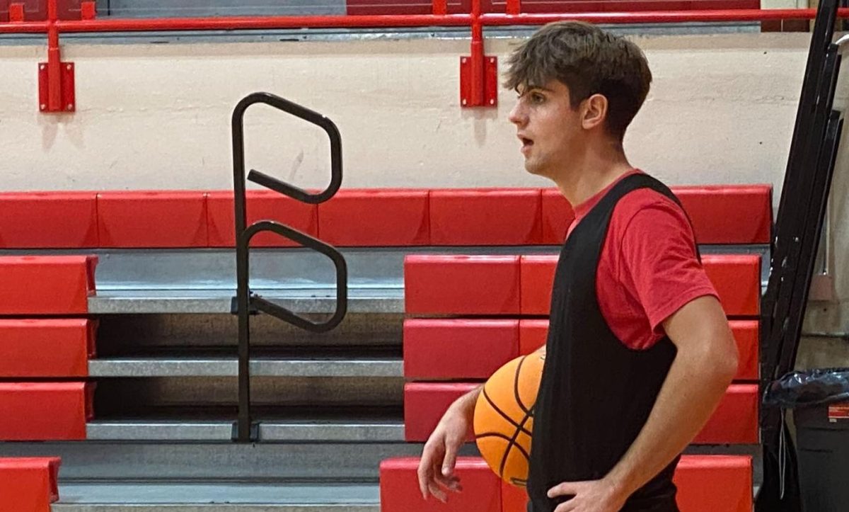 Charleston High School senior guard Luke Bonnstetter plays in a scrimmage during a Charleston boys basketball practice on Nov. 20 at CHS in Baker Gymnasium. 