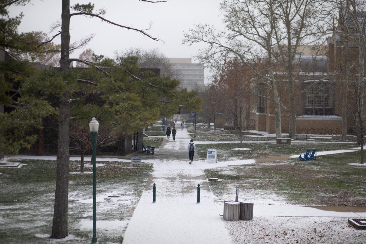 Eastern had its first measurable snowfall, on the first day back on campus after Thanksgiving break. Student were prepared in winter coats for the cold weather Monday.