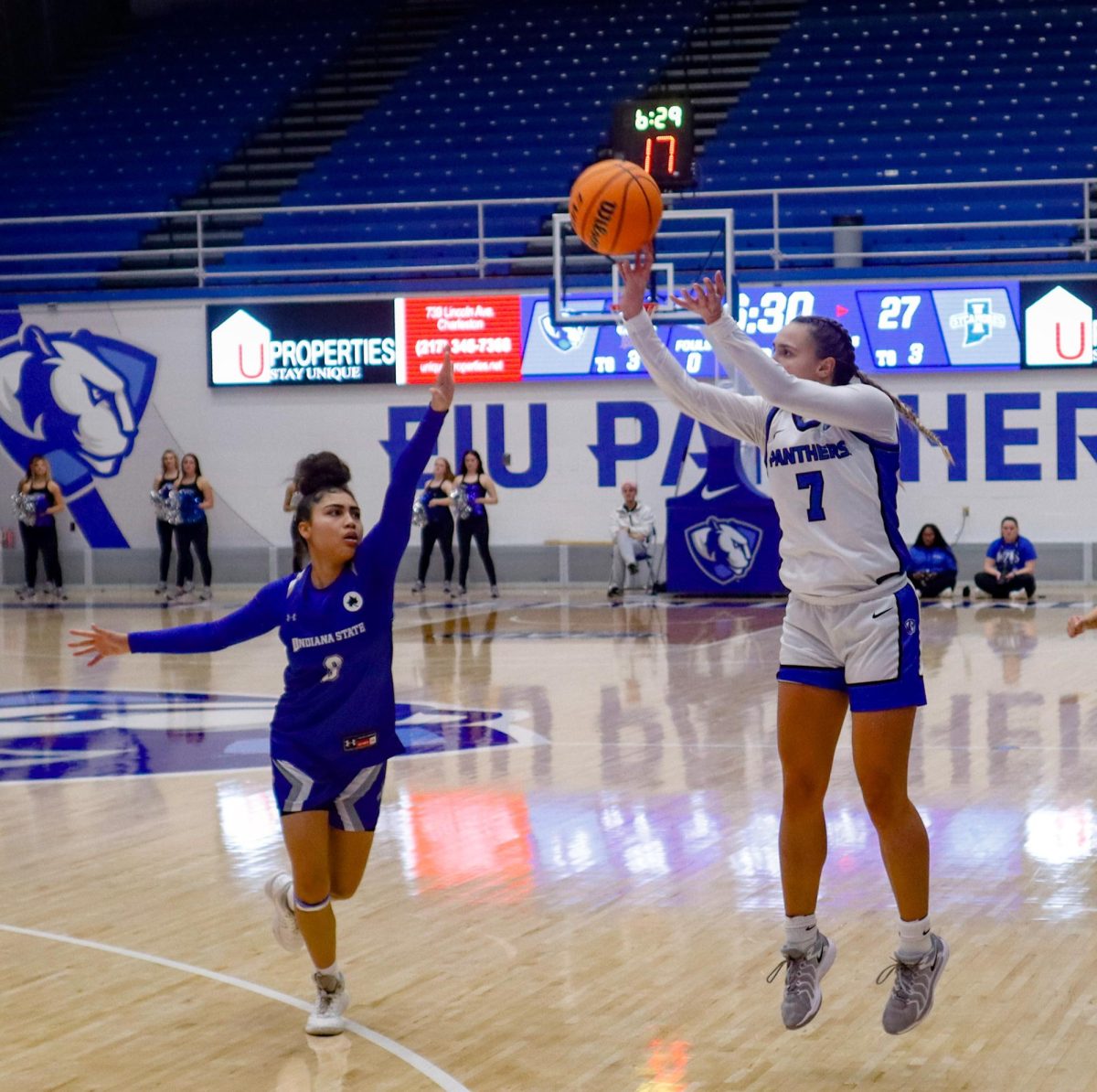 Senior guard Kiyley Flowers shoots a three point shot at the Eastern Illinois University women's basketball game against the Indiana State Sycamores at Groniger Arena in Charleston, Ill., Friday, Dec. 6 2024.