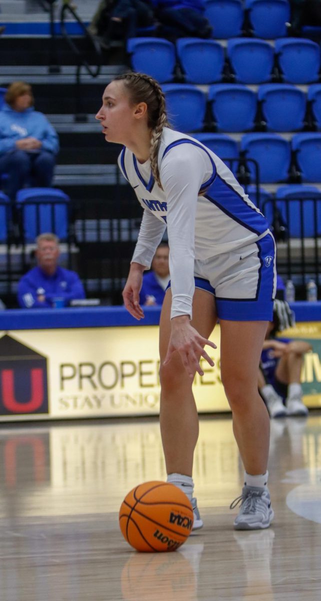 Senior guard Kiyley Flowers dribbles during the Eastern Illinois University women's basketball game against Indiana State Sycamores at Groniger Arena in Charleston, Ill., Friday, Dec. 6 2024.