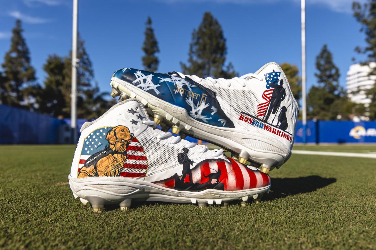 Former Eastern quarterback and current Los Angeles Rams’ quarterback Jimmy Garoppolo’s custom cleats for K9s for Warriors. Garoppolo wore these cleats in the Rams’ 44-42 win over the Buffalo Bills on Sunday, December 8 at SoFi Stadium.