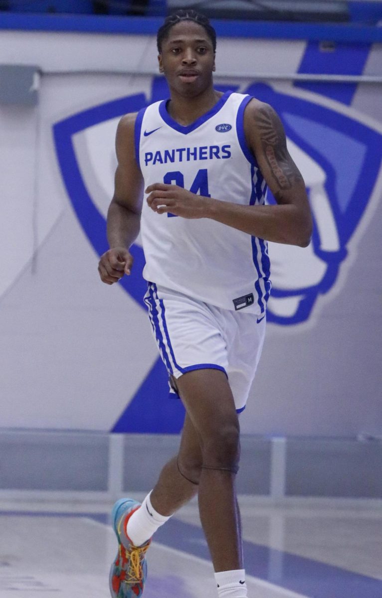 Freshman forward Terry McMorris runs back on offense to get ready to try and score during Eastern’s win against Calumet College of St. Joseph 87-57 at the Kid’s Day Game on Friday