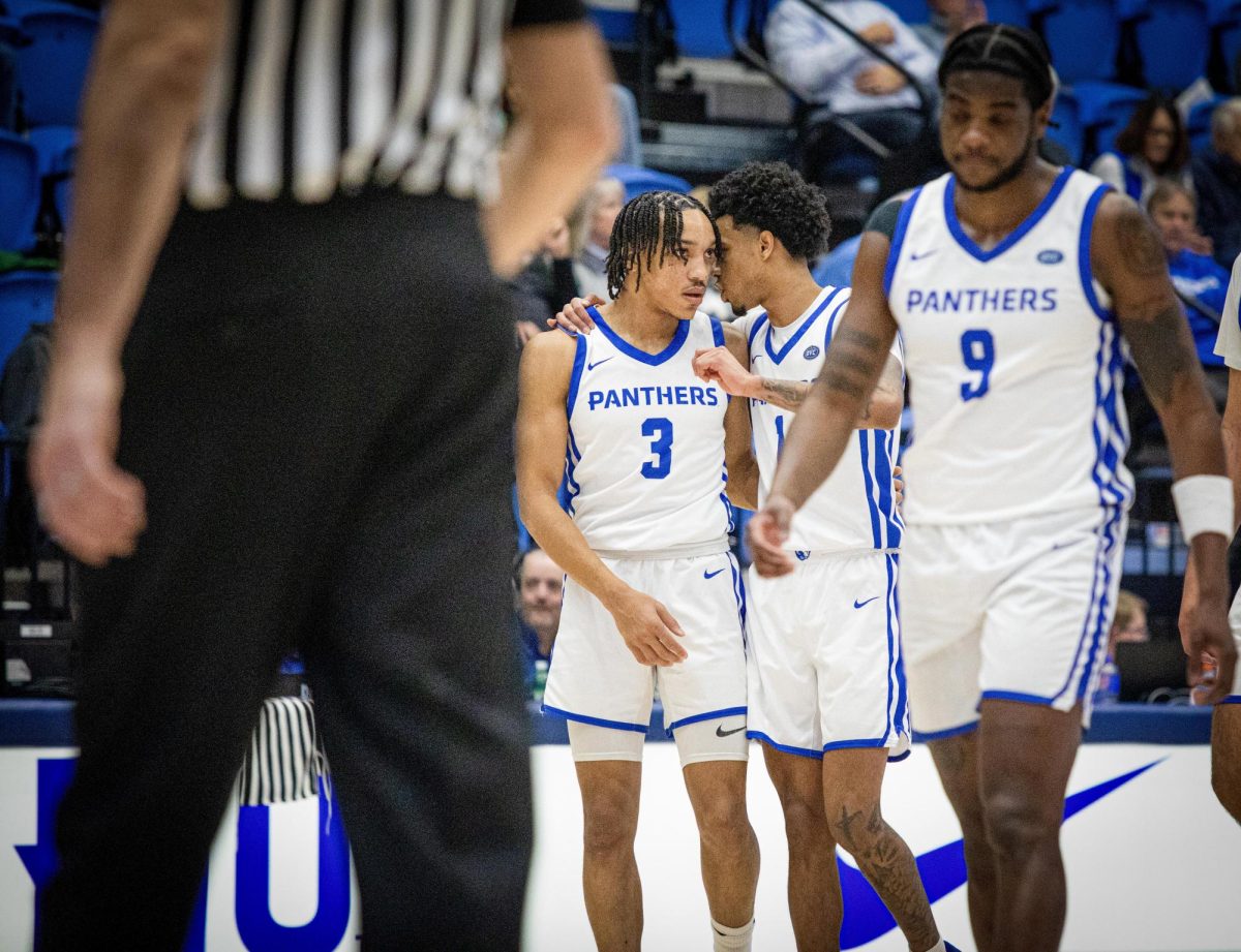 Senior guard NaKyel Shelton (left) talks to senior guard Corey Sawyer Jr, during the game against Morehead State, Eastern Illinois men's basketball lost 73-66 to Morehead state Thursday Jan 23,2025. in the Groniger Arena on the Eastern Illinois University campus, Charleston Ill.  